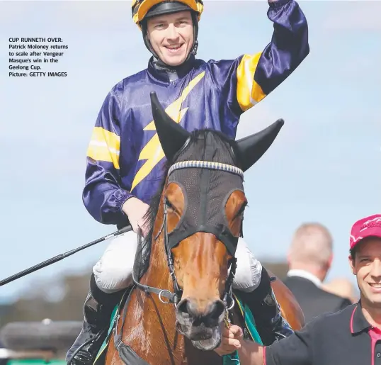  ?? Picture: GETTY IMAGES ?? CUP RUNNETH OVER: Patrick Moloney returns to scale after Vengeur Masque’s win in the Geelong Cup.