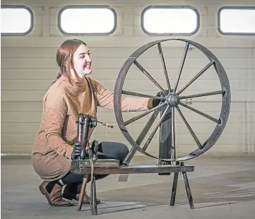  ??  ?? DEDICATED: Lyndsay Mackinnon with a spinning wheel. Picture by Mhairi Edwards.