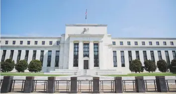  ?? AP ?? ■ The Federal Reserve building in Washington. An analysis of Fed funds futures contracts compiled by CME Group shows investors see a 90 per cent probabilit­y the Fed will raise rates in September.