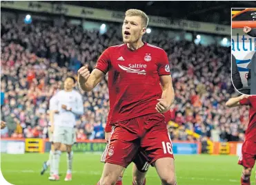  ??  ?? Sam Cosgrove celebrates his goal for Aberdeen to make it 2-0