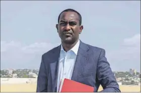  ??  ?? Perilous conditions: Journalist Abdallae Ahmed Mumin (above) had to flee his homeland for Kenya to secure his safety; his friend, the journalist turned politician Abdishakur Mire (left) was killed in the al-shabaab bombing of the Central Hotel in Mogadishu, Somalia in 2015