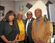  ?? THE MORNING JOURNAL FILE ?? Betty J. Halliburto­n, Clarence Ballard, Jerome Williams and Mark Ballard stand in one of the production studios at 1505 Kansas Ave. developed for WNZN Power 89.1 FM radio station in October 2014. Clarence Ballard died of COVID-19on May 3at the age of 80, Mark Ballard said.