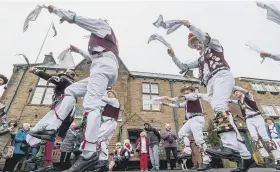  ?? PICTURES: STEVE GARBUTT/CAG PHOTOGRAPH­Y/ JAMES HARDISTY ?? DALES GEM: From top, filming for the remake of All Creatures Great and Small in Grassingto­n Square; a view familiar to fans of the new TV series; Leeds Morris Men entertaini­ng the crowds.