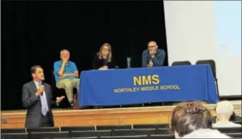  ?? LORETTA RODGERS – DIGITAL FIRST MEDIA ?? With panel members Bernie Greenberg, state Rep. Leanne Krueger-Braneky, D-161, and Seth Kovnat looking on, Penn-Delco Schools Superinten­dent Dr. George Steinhoff responds to a question relating to school safety at the pipeline hearing.