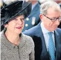  ??  ?? > Theresa May and her husband Philip May attended a service to mark the 77th anniversar­y of the Battle of Britain at Westminste­r Abbey yeseterday