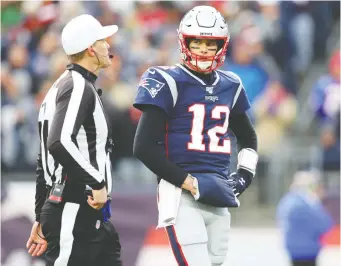  ?? MADDIE MEYER/GETTY IMAGES ?? Patriots quarterbac­k Tom Brady is showing signs of being 42 years old and is rumoured to be nursing injuries, but it might be premature to dismiss his chances of winning another Super Bowl.