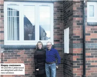  ??  ?? Happy customers Mr and Mrs Calderwood are delighted with their new windows