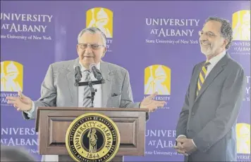  ?? Lori Van Buren / times union archive ?? morris massry, university at Albany foundation director emeritus, speaks during an event to honor the massry family and its commitment to support and advance the university’s School of Business in September 2015. massry’s son, norman massry, is at right.