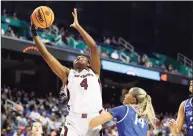  ?? Sarah Stier / Getty Images ?? South Carolina’s Aliyah Boston (4) fights for a rebound against Creighton’s Mallory Brake (14) on Sunday.