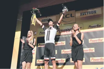  ?? — Reuters photo ?? Team Sunweb rider Michael Matthews of Australia reacts on the podium after winning the 181.5-km stage of the 104th Tour de France cycling race between Blagnac and Rodez.