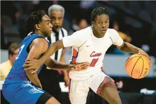  ?? STAFF FILE ?? Princess Anne’s Styles Clemmons, right, averaged 19.5 points last season as a freshman, earning first-team allstate honors. He helped lead the Cavaliers to the state tournament and the program’s best season since they won a state title in 1999.