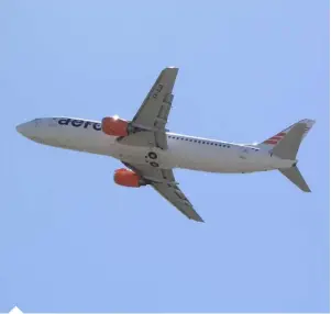 ??  ?? One of Aero’s 737-500 aircraft in flight