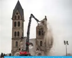  ?? —AFP ?? ERKELENZ, Germany: St Lambertus Church in Erkelenz-Immerath, western Germany, is being demolished in order to make possible brown coal surface mining.