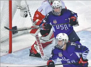  ?? AFP ?? Monique Lamoureux-Morando (No 7) and her sister, Jocelyne Lamoureux-Davidson, helped the US to its first women’s hockey gold medal at this year’s Winter Olympics in Pyeongchan­g.