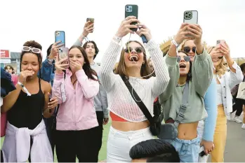  ?? GARY CORONADO/LOS ANGELES TIMES ?? Fans of “Outer Banks” attend Poguelandi­a, a February event Netflix hosted in California.