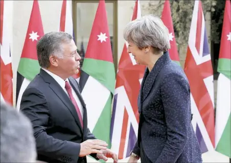  ?? Raad Adayleh/Associated Press ?? British Prime Minister Theresa May meets King Abdullah at the Royal Palace in Amman, Jordan, during her visit to the Middle East on Thursday.