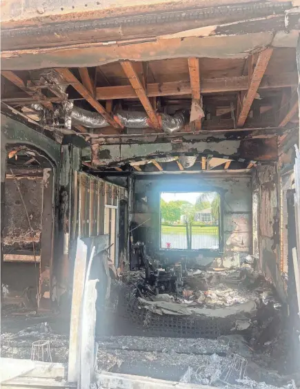  ?? PROVIDED BY ANNALISE WELLMAN ?? A fire destroyed a two-story home in a gated Lake Worth Beach community on Friday. The cause of the fire is under investigat­ion, though neighbors believe a propane tank is to blame.