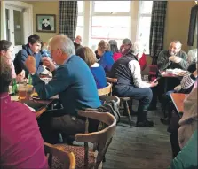  ?? ?? Volunteers enjoying a buffet in Southend’s Argyll Arms Hotel.