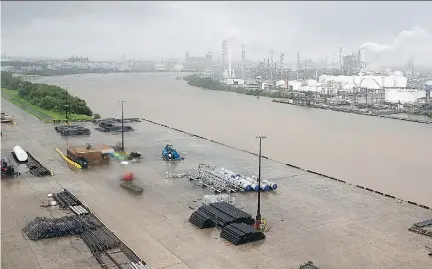  ?? THOMAS B. SHEA / AFP / GETTY IMAGES ?? Hurricane Harvey has struck areas such as the Houston Ship Channel refinery section in the Gulf Coast region.