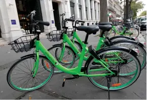  ?? (Charles Platiau/Reuters) ?? GOBEE BICYCLES are seen on a sidewalk in Paris last year. Over the past few days, Gobee’s green bikes have virtually disappeare­d from Paris streets, and its cellphone app was inactive.