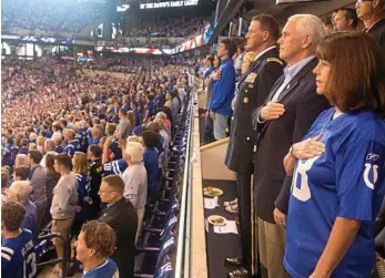  ?? PHOTO: OFFICE OF THE VICE PRESIDENT/EPA ?? MAKING A STAND: US Vice President Mike Pence (second closest) and his wife Karen (closest) stand tall at the start of the national anthem.