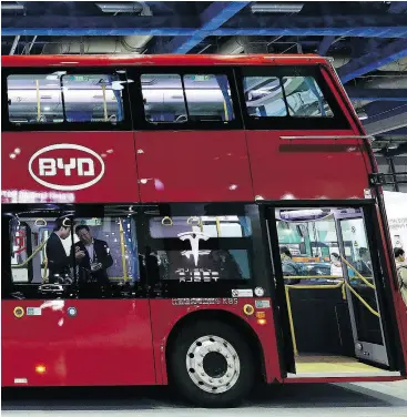  ?? SEONGJOON CHO / BLOOMBERG ?? A BYD Co. double-decker electric bus at the EV Trend Korea exhibition in Seoul on April 12. In seven years, China’s BYD has become a world leader in electric buses.