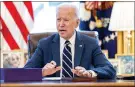  ?? ANDREW HARNIK — THE ASSOCIATED PRESS ?? President Joe Biden speaks before signing the American Rescue Plan, a coronaviru­s relief package, in the Oval Office of the White House on Thursday in Washington.