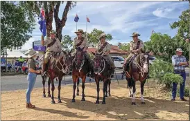  ?? PHOTOS: CONTRIBUTE­D ?? A Light Horse re-enactment troop was on hand to pay tribute to Major AB Paterson, the poet served with distinctio­n in WWI.