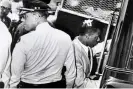  ?? ?? John Lewis enters a police van after his arrest in Jackson, Mississipp­i, on 24 May 1961. Photograph: Bettmann via Getty Images