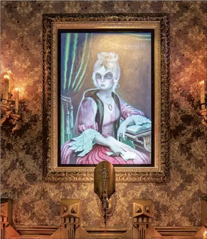  ?? Photograph­s by Christian Thompson Disneyland Resort ?? “APRIL TO DECEMBER” is back at Haunted Mansion. Also look for a one-eyed cat, a nod to a famed park architect’s creation.