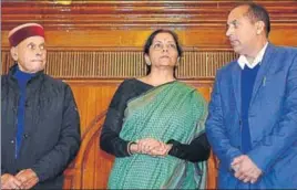 ?? DEEPAK SANSTA/HT ?? (From left) Former chief minister Prem Kumar Dhumal, defence minister Nirmala Sitharaman and Seraj MLA Jai Ram Thakur in Shimla on Thursday.