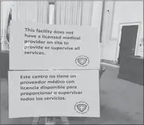  ?? JENNA CARLESSO | JCARLESSO@COURANT.COM ?? SAMPLE SIGNS created by the city demonstrat­e the type of disclosure­s that the so-called crisis pregnancy centers will have to make beginning Oct. 1.