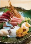  ?? CONTRIBUTE­D BY HENRI HOLLIS ?? Sashimi taku jyo at Sushi Hayakawa is a selection of sashimi that included bigeye tuna, fatty tuna (toro) and sea urchin roe (uni).