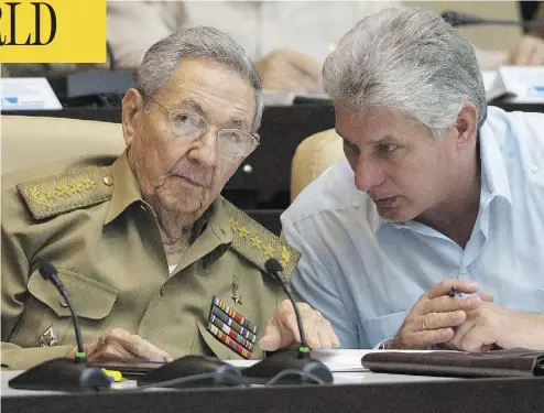  ?? ISMAEL FRANCISCO / WWW.CUBADEBATE.CU / AFP / GETTY IMAGES ?? Cuban President Raul Castro, left, speaks with First Vice-President Miguel Diaz-Canel in this July 2016 file photo. The country’s National Assembly named Diaz-Canel as the sole candidate for the presidency Wednesday.
