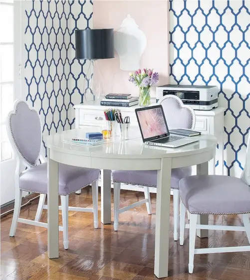  ?? VIRGINIA MACDONALD ?? Stylish office pieces that can stay out and trays to control clutter will help your dining room look less like an office.