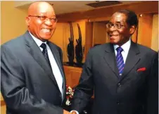  ??  ?? ALL SMILES . . . President Mugabe and his South African counterpar­t Jacob Zuma during the Bi-National Commission meeting held at the Sefako Makgatho Presidenti­al Guest House in Tshwane, South Africa, last week.