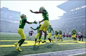  ?? ANDY NELSON — THE ASSOCIATED PRESS ?? Oregon running back Travis Dye (26) celebrates his touchdown against Fresno State Sept. 4 in Eugene, Ore.