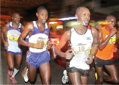  ?? (SUN.STAR FOTO/ARNI ACLAO) ?? EASY DOES IT. Men’s division winner David Kipsang (left) stays behind from left(Jackson Chirchir, Mbie James Kidrop and Douglas Mwiti) early in the race.