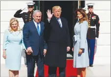  ?? AP PHOTO ?? President Donald Trump and first lady Melania Trump greet Israeli Prime Minister Benjamin Netanyahu and his wife Sara Netanyahu as they arrive at the White House.