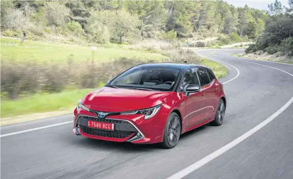  ??  ?? Toyota Corolla – the line-up will start from £21,300 for a 1.2-litre turbo hatch when it goes on sale in March with hybrids costing from £23,750