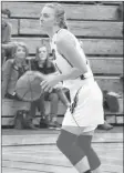  ?? COLIN CHISHOLM ?? Mackenzie Smith makes her way down the court during the prep girls first home game.