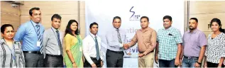  ??  ?? From left: SLT Legal Officer Shiromi Saputhanth­ri, SLT Sales Metro DGM and Chethana Attanayake, SLT Sales Metro GM and Lakmal Jayasinghe, SLT External Channel Manager Kumari Wijesuriya, SLT Chief Sales Officer Imantha Wijekoon, SLT CEO Kiththi Perera, Coral property Developers (Pvt.) Ltd Chairman S. Pirabahara­n, Coral property Developers (Pvt.) Ltd Managing Director S. Vasiharan, Coral Property Developers (Pvt.) Ltd Project Engineer D. Navaneeth and Coral property Developers (Pvt.) Ltd Planning Engineer S.C. Kaushika