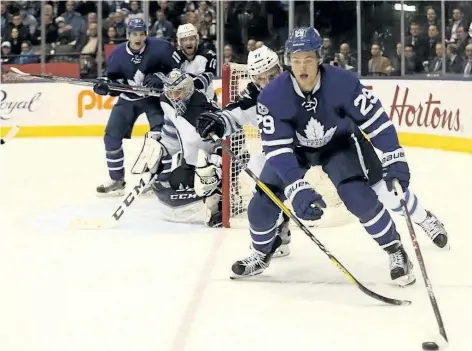  ?? JACK BOLAND/POSTMEDIA NETWORK ?? Toronto Maple Leafs winger William Nylander (29) works the puck during the third period in Toronto on Wednesday against the Winnipeg Jets. Nylander has become a powerplay king, he leads his team and all rookies with 19 power-play points and the entire...