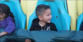  ?? PHOTO ANDY VELEZ ?? Toddler ian alejandro is all smiles as he enjoys a carnival ride at the 2019 Carrot Festival and Street Fair in Holtville on Saturday.