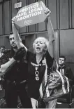  ?? J. Scott Applewhite / Associated Press ?? A protester interrupts Brett Kavanaugh testifying before the Senate Judiciary Committee.