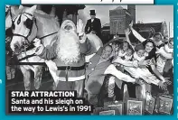  ?? ?? STAR ATTRACTION Santa and his sleigh on the way to Lewis’s in 1991