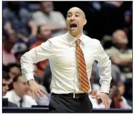  ?? AP file photo ?? Texas Coach Shaka Smart led the Longhorns to a season-opening victory over Eastern Illinois on Tuesday night heading into Friday night’s game against Arkansas at El Paso, Texas.