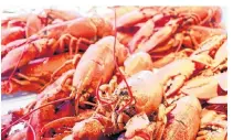  ?? 1223RF STOCK ?? Exemptions to allow temporary foreign workers into Canada have been put in place to allow workers into the seafood and agri-food industries.