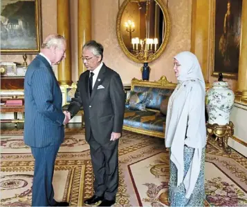  ?? — Photo from Istana negara Facebook page ?? Sultan abdullah and Tunku azizah meeting King Charles at Buckingham Palace, London in october 2022.