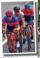  ??  ?? ●●People line the streets as the Tour of Britain passing through Norden Village